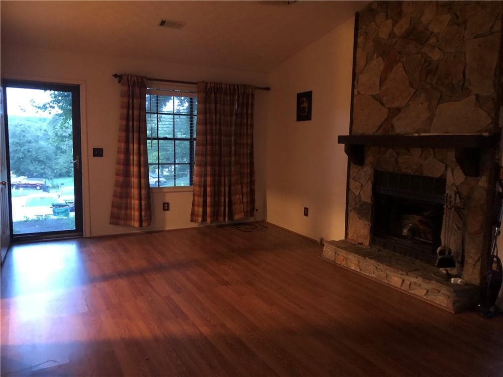 3 bedroom, 2 bathroom, 1,300 sq ft single family residence for sale at 4817 Mainstreet Valley Trace, Stone Mountain, GA 30088 — photo 2
