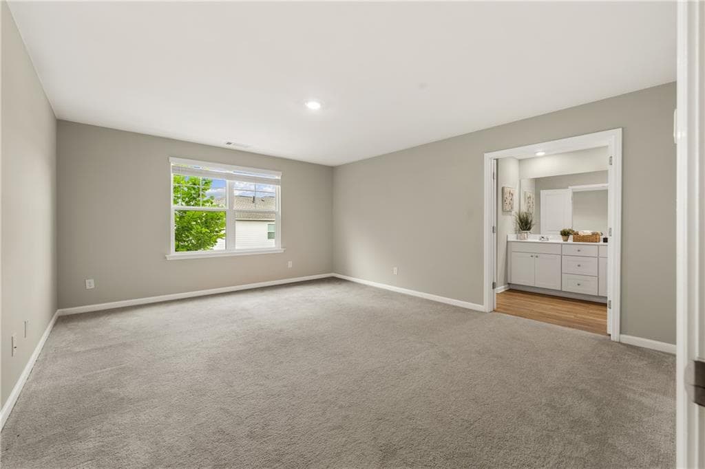 4 bedroom, 3 bathroom, 2,435 sq ft single family residence for sale at 4335 Magpie Drive, Hoschton, GA 30548 — photo 4