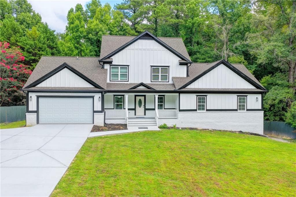 7 bedroom, 4 bathroom, 4,918 sq ft single family residence for sale at 3326 Hidden Forest Drive, Snellville, GA 30078 — photo 2