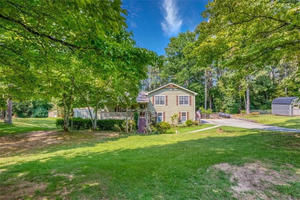 3 bedroom, 2 bathroom, 2,084 sq ft single family residence for sale at 4234 Timber Trace Road, Loganville, GA 30052 — photo 1 of 45