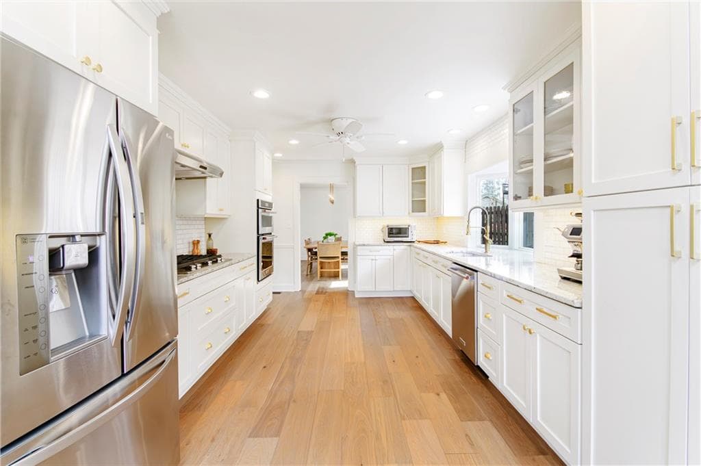 4 bedroom, 4 bathroom, 4,802 sq ft single family residence for sale at 10120 Kinross Road, Roswell, GA 30076 — photo 7