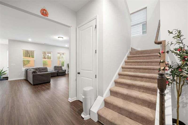 5 bedroom, 3 bathroom single family residence for sale at 253 Birchwood Row, Holly Springs, GA 30115 — photo 4