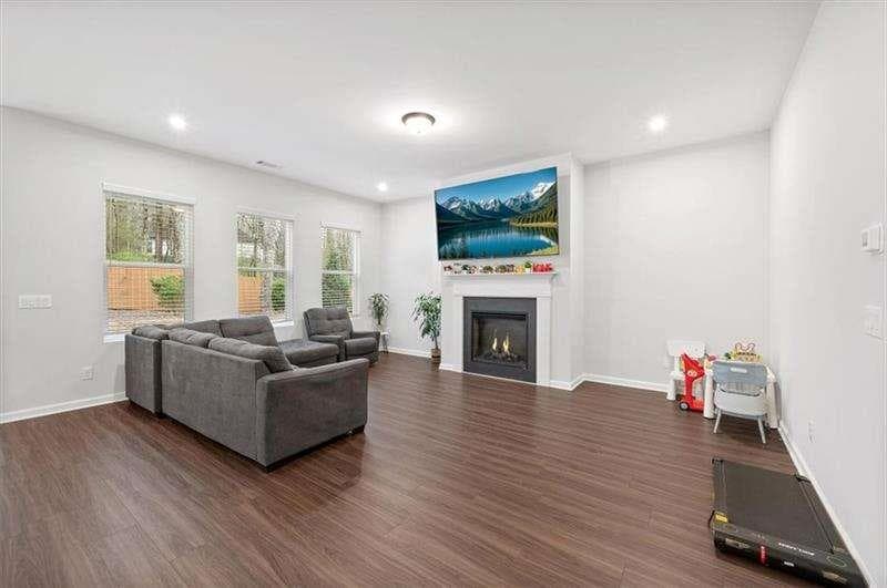 5 bedroom, 3 bathroom single family residence for sale at 253 Birchwood Row, Holly Springs, GA 30115 — photo 6