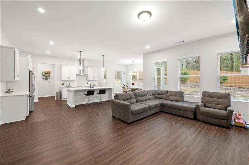 5 bedroom, 3 bathroom single family residence for sale at 253 Birchwood Row, Holly Springs, GA 30115 — photo 9