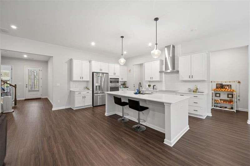 5 bedroom, 3 bathroom single family residence for sale at 253 Birchwood Row, Holly Springs, GA 30115 — photo 10