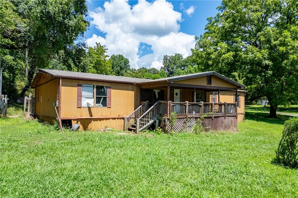 4 bedroom, 2 bathroom, 1,736 sq ft single family residence for sale at 4005 C Rogers Road, Gainesville, GA 30506 — photo 2