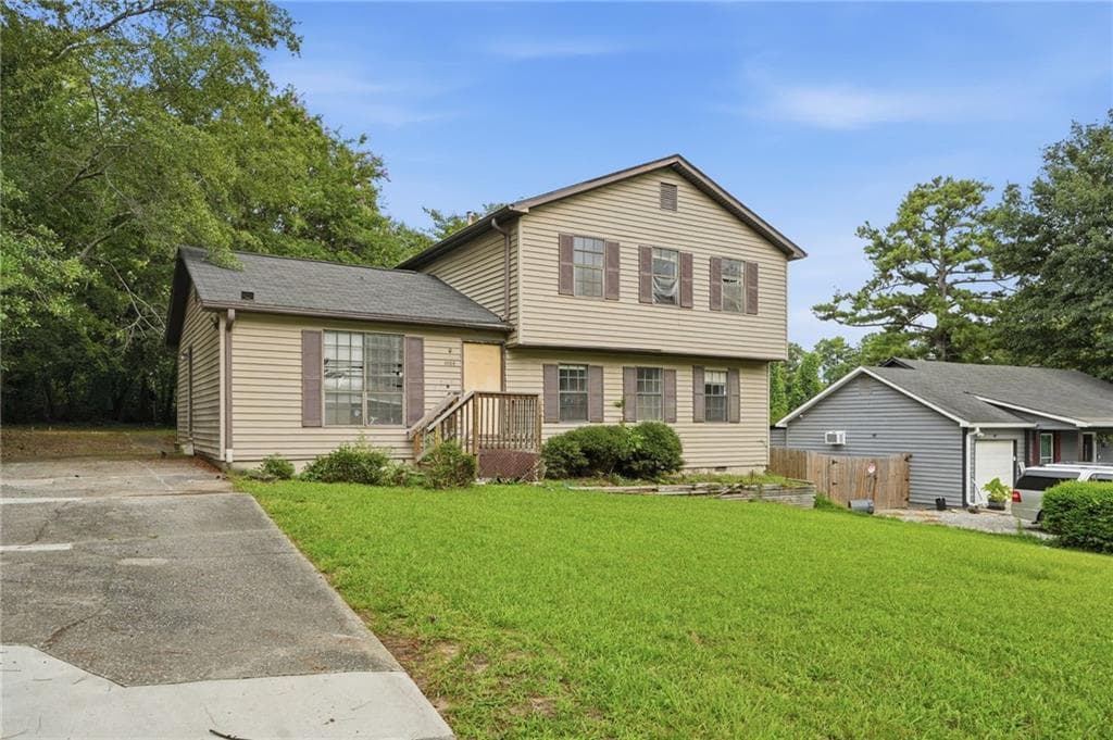 4 bedroom, 3 bathroom, 1,544 sq ft single family residence for sale at 1135 Kristen Cove, Atlanta, GA 30349