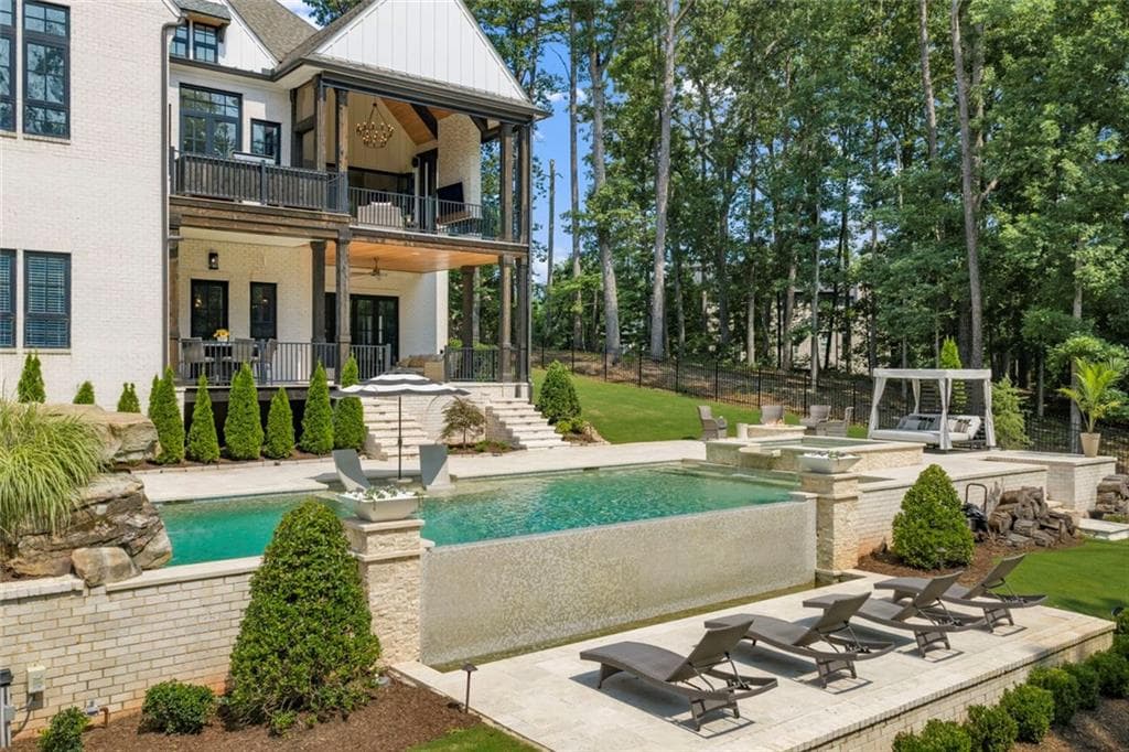 6 bedroom, 9 bathroom, 9,417 sq ft single family residence for sale at 761 Woodvale Point, Suwanee, GA 30024 — photo 8