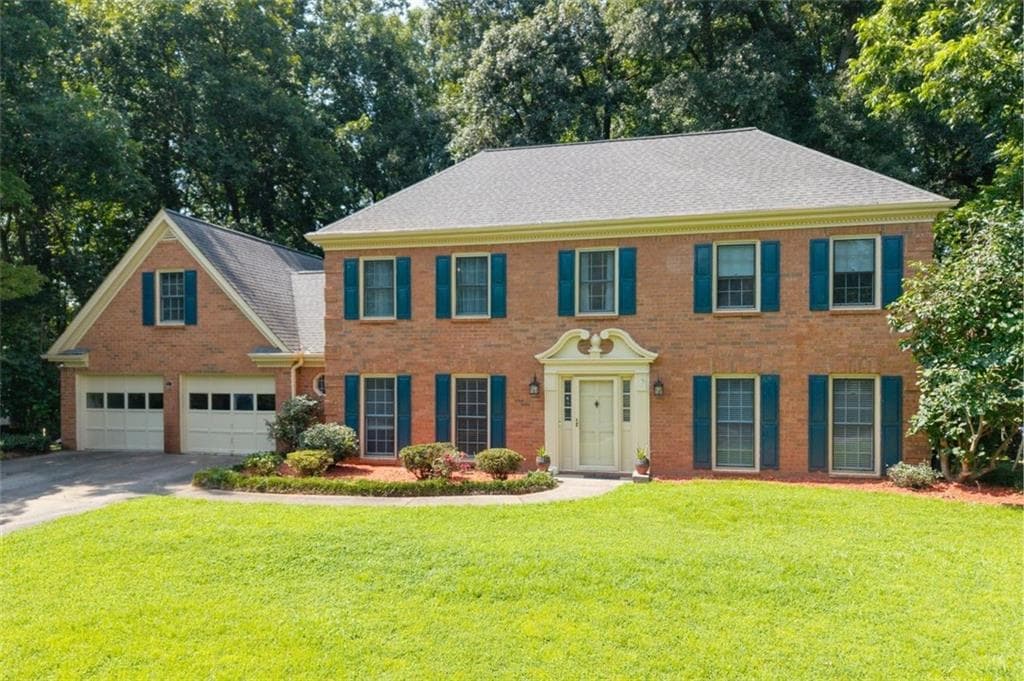 4 bedroom, 3 bathroom, 3,860 sq ft single family residence for sale at 5497 Georgetown Trace, Lilburn, GA 30047 — photo 3
