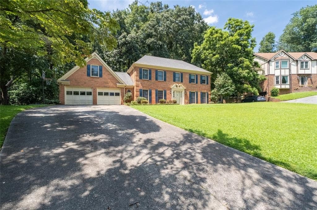 4 bedroom, 3 bathroom, 3,860 sq ft single family residence for sale at 5497 Georgetown Trace, Lilburn, GA 30047 — photo 4