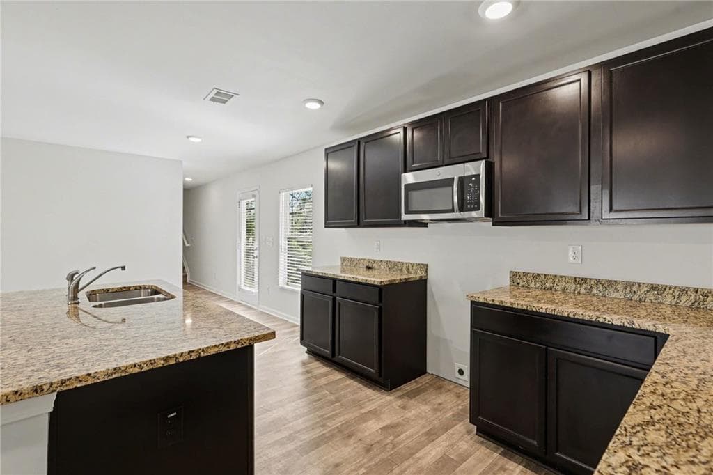 4 bedroom, 3 bathroom, 2,278 sq ft single family residence for sale at 6506 Beaver Creek Trail, Atlanta, GA 30349 — photo 6