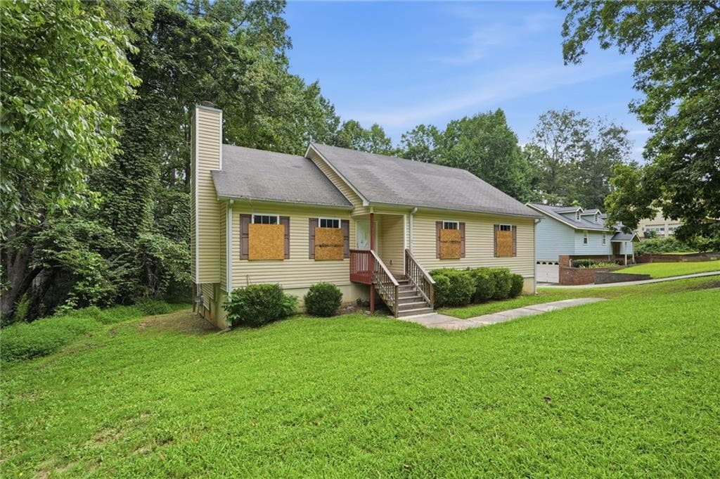 5 bedroom, 3 bathroom, 1,588 sq ft single family residence for sale at 6013 Radford Drive, Riverdale, GA 30296 — photo 3