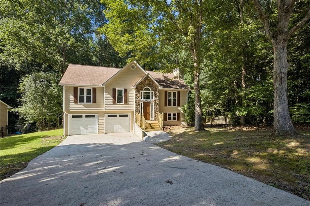 4 bedroom, 3 bathroom, 2,002 sq ft single family residence for sale at 7060 Old Post Court, Cumming, GA 30028 — photo 7
