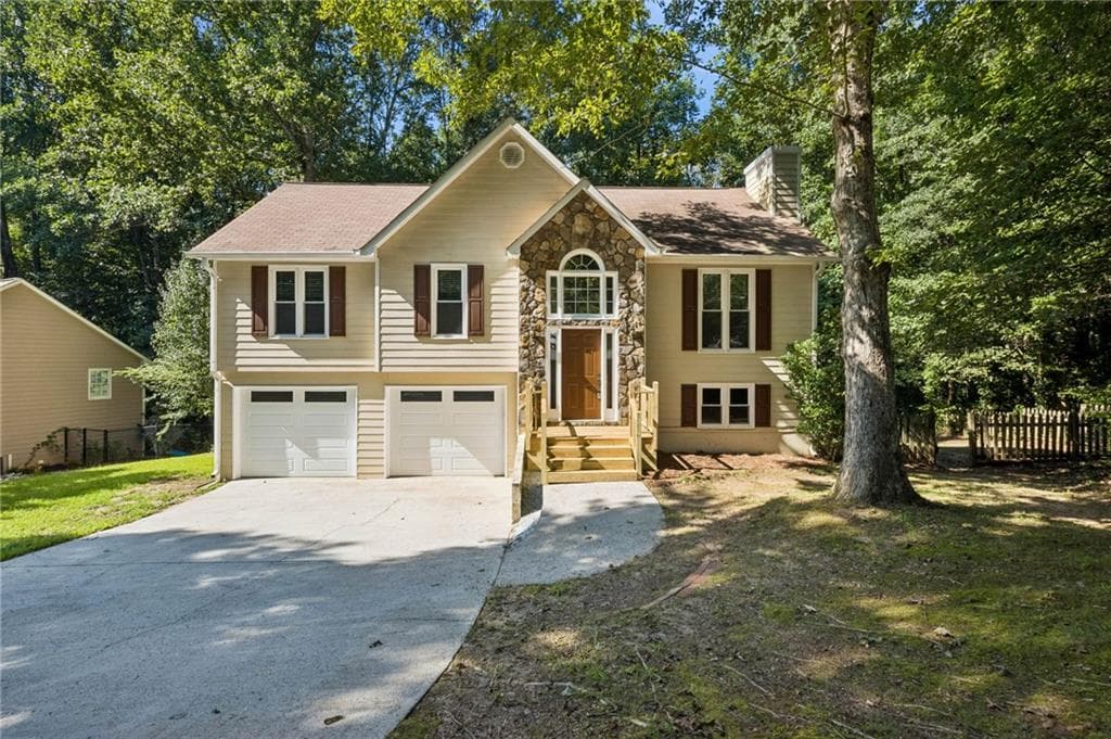 4 bedroom, 3 bathroom, 2,002 sq ft single family residence for sale at 7060 Old Post Court, Cumming, GA 30028 — photo 8