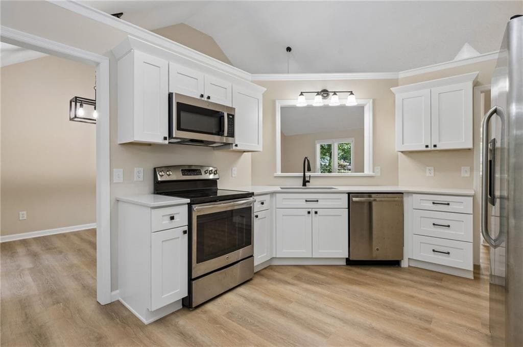 4 bedroom, 3 bathroom, 2,002 sq ft single family residence for sale at 7060 Old Post Court, Cumming, GA 30028 — photo 3
