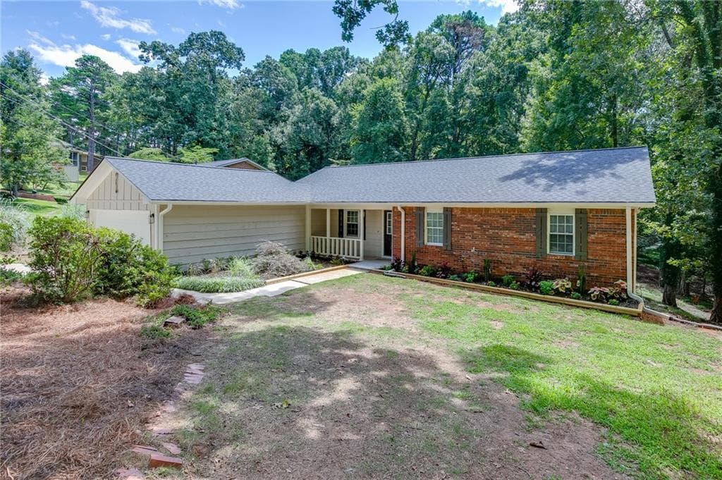 4 bedroom, 3 bathroom, 2,757 sq ft single family residence for sale at 4445 Lake Forest Drive, Oakwood, GA 30566 — photo 2