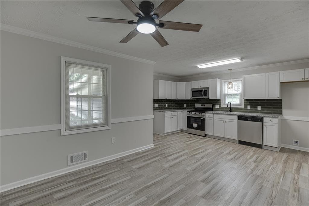 4 bedroom, 3 bathroom, 2,757 sq ft single family residence for sale at 4445 Lake Forest Drive, Oakwood, GA 30566 — photo 5