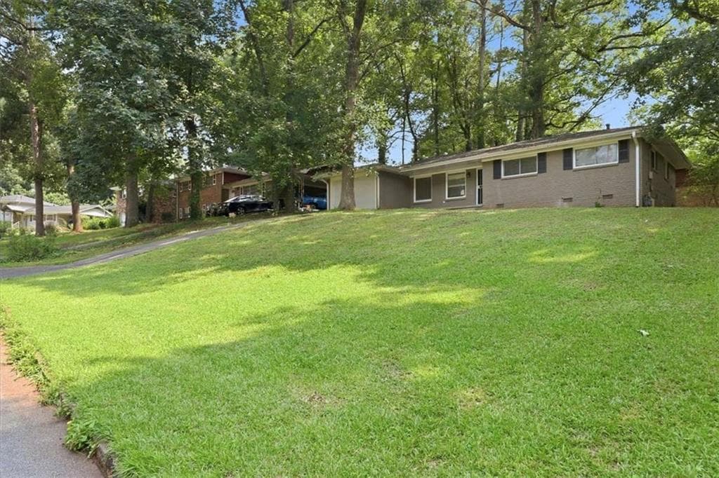 3 bedroom, 2 bathroom, 1,262 sq ft single family residence for sale at 3603 Mecklinburg Pl, Decatur, GA 30032 — photo 2