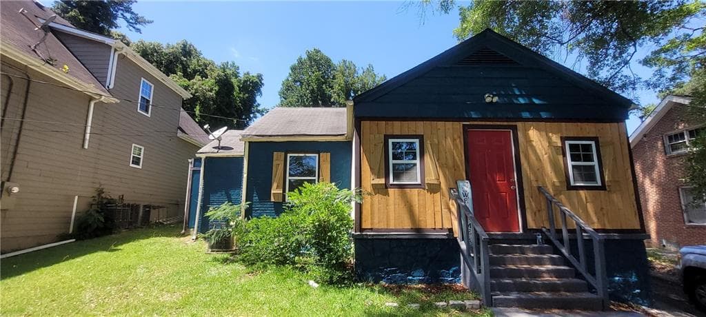 4 bedroom, 2 bathroom, 1,088 sq ft single family residence for sale at 2009 Baker Road, Atlanta, GA 30318 — photo 2