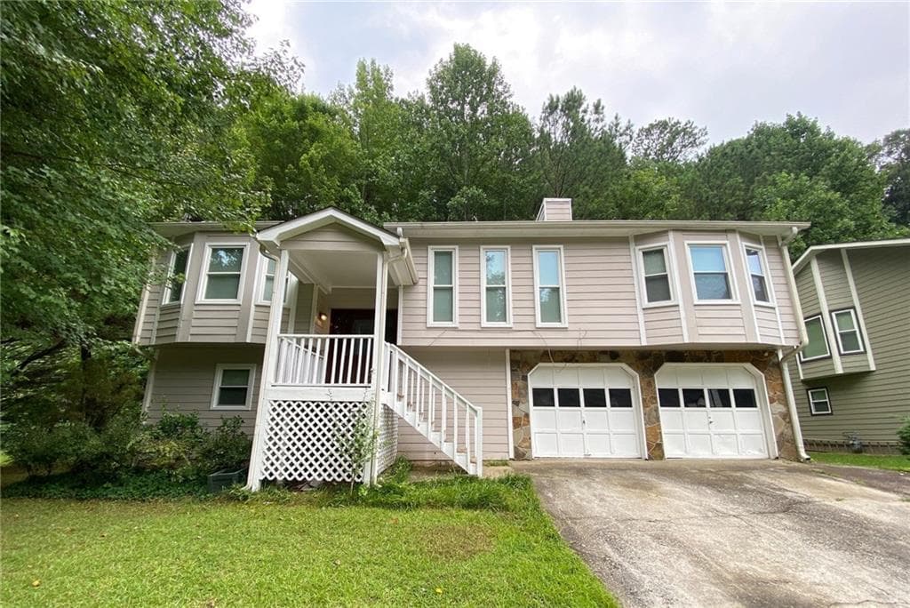 5 bedroom, 3 bathroom, 1,236 sq ft single family residence for sale at 1326 Williamsburg Lane, Norcross, GA 30093 — photo 2