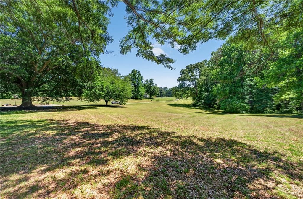 4 bedroom, 2 bathroom, 2,084 sq ft single family residence for sale at 511 Bart Manous Road, Canton, GA 30115 — photo 2