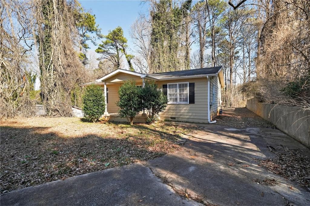 3 bedroom, 2 bathroom, 1,140 sq ft single family residence for sale at 1826 County Line Road, Atlanta, GA 30331 — photo 2