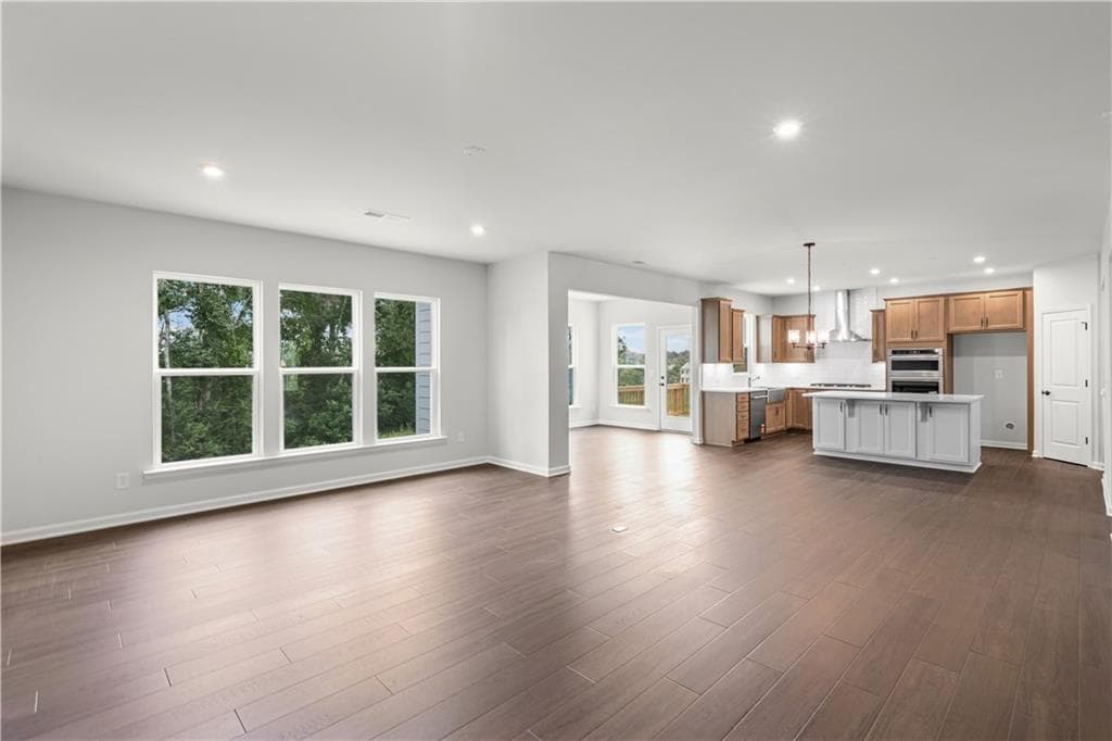 6 bedroom, 4 bathroom, 3,230 sq ft single family residence for sale at 7271 Thistle Down Way, Flowery Branch, GA 30542 — photo 3