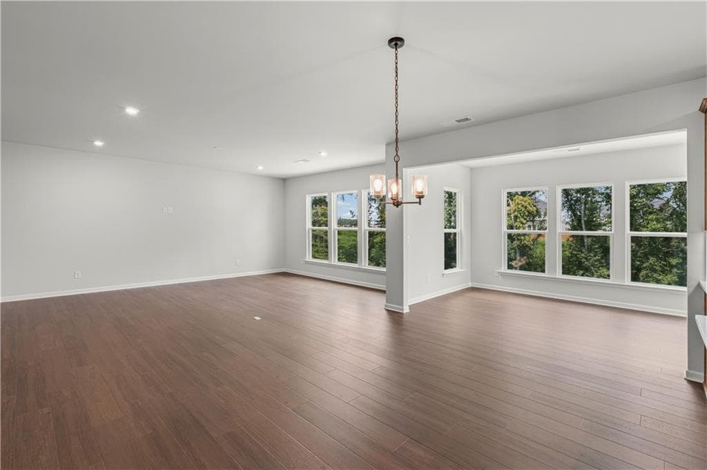 6 bedroom, 4 bathroom, 3,230 sq ft single family residence for sale at 7271 Thistle Down Way, Flowery Branch, GA 30542 — photo 4