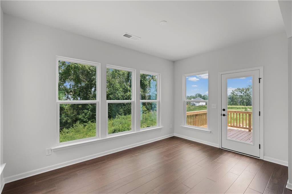 6 bedroom, 4 bathroom, 3,230 sq ft single family residence for sale at 7271 Thistle Down Way, Flowery Branch, GA 30542 — photo 5