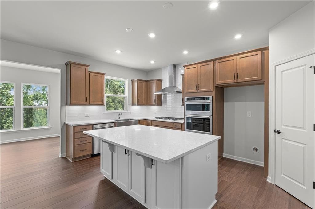 6 bedroom, 4 bathroom, 3,230 sq ft single family residence for sale at 7271 Thistle Down Way, Flowery Branch, GA 30542 — photo 6