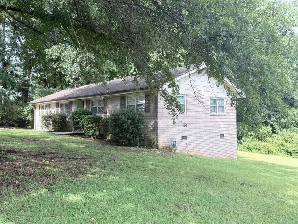 3 bedroom, 2 bathroom, 1,474 sq ft single family residence for sale at 2195 Rockdale Drive, Conyers, GA 30012 — photo 3