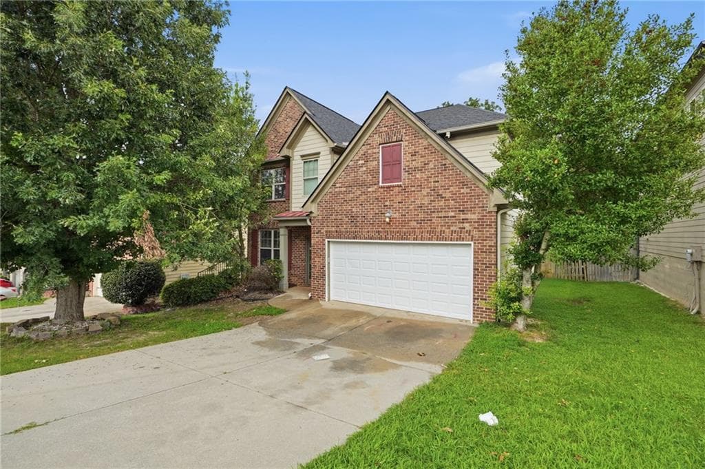4 bedroom, 3 bathroom, 3,100 sq ft single family residence for sale at 5804 Providence Court, Union City, GA 30291 — photo 2