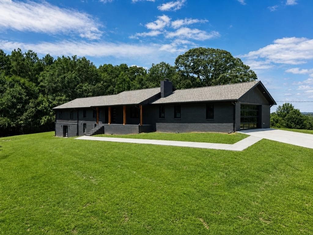 6 bedroom, 3 bathroom, 6,177 sq ft single family residence for sale at 280 Etheridge Road, Auburn, GA 30011 — photo 4