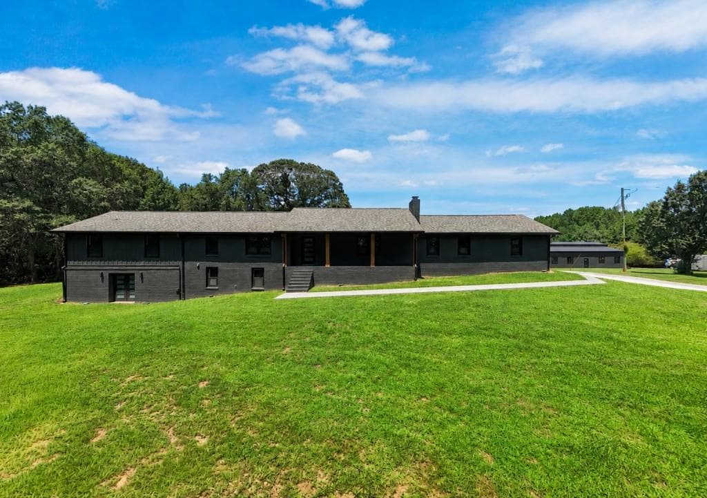 6 bedroom, 3 bathroom, 6,177 sq ft single family residence for sale at 280 Etheridge Road, Auburn, GA 30011 — photo 5