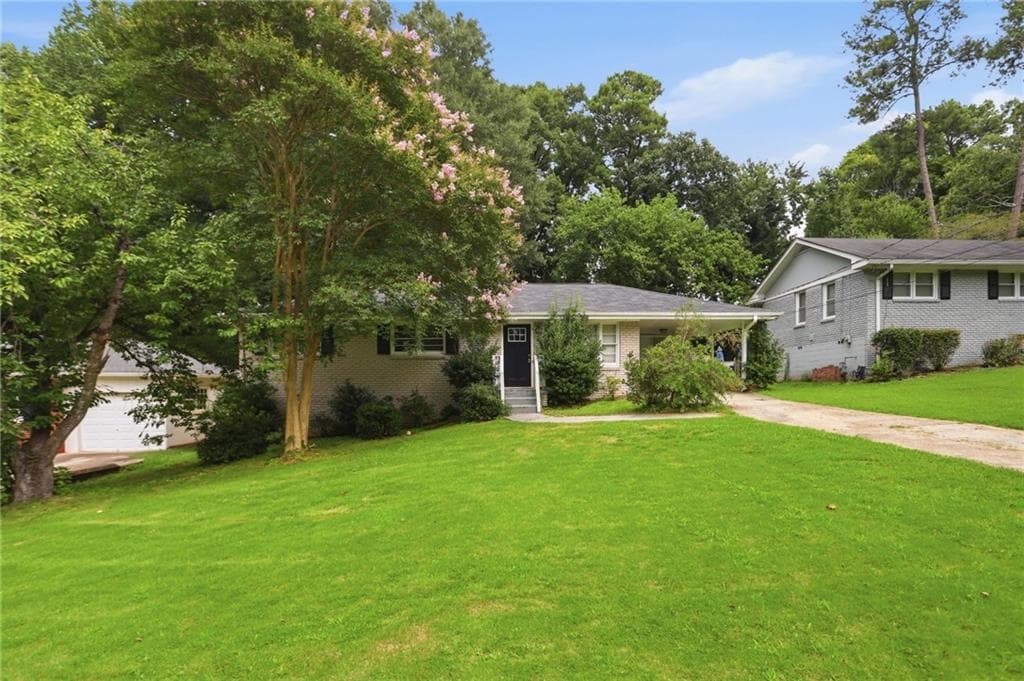 3 bedroom, 1 bathroom, 1,209 sq ft single family residence for sale at 1068 Longshore Drive, Decatur, GA 30032 — photo 1 of 28
