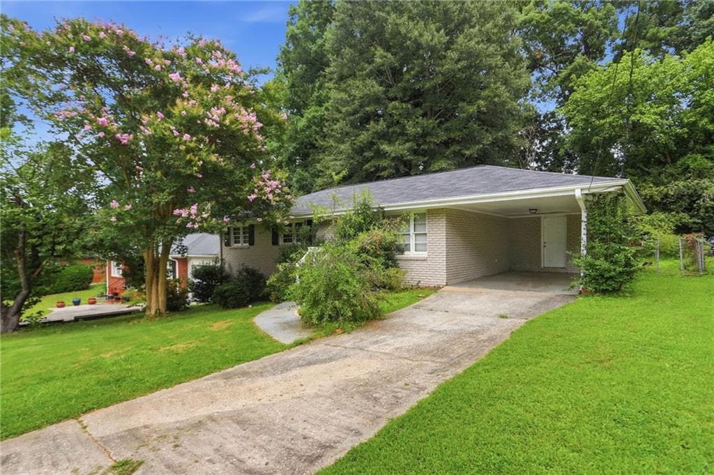 3 bedroom, 1 bathroom, 1,209 sq ft single family residence for sale at 1068 Longshore Drive, Decatur, GA 30032 — photo 2