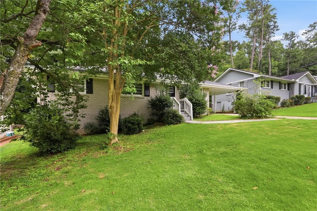 3 bedroom, 1 bathroom, 1,209 sq ft single family residence for sale at 1068 Longshore Drive, Decatur, GA 30032 — photo 3