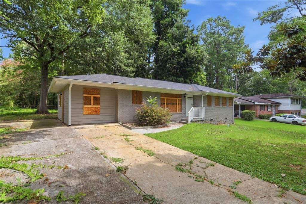4 bedroom, 2 bathroom, 1,244 sq ft single family residence for sale at 3456 Glensford Drive, Decatur, GA 30032 — photo 2