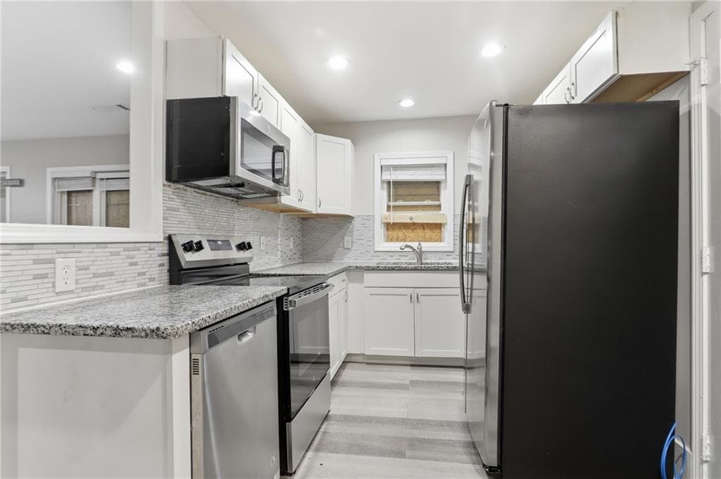 4 bedroom, 2 bathroom, 1,244 sq ft single family residence for sale at 3456 Glensford Drive, Decatur, GA 30032 — photo 10