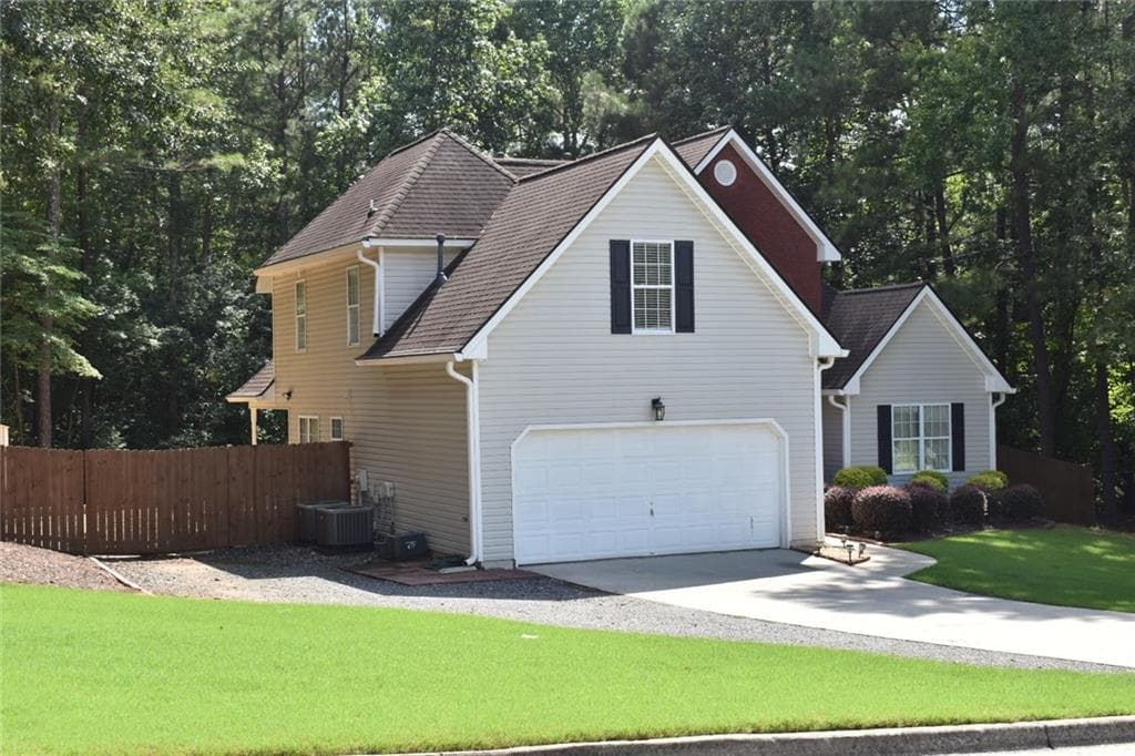 4 bedroom, 3 bathroom, 1,793 sq ft single family residence for sale at 602 Penhollaway Court, Loganville, GA 30052 — photo 4