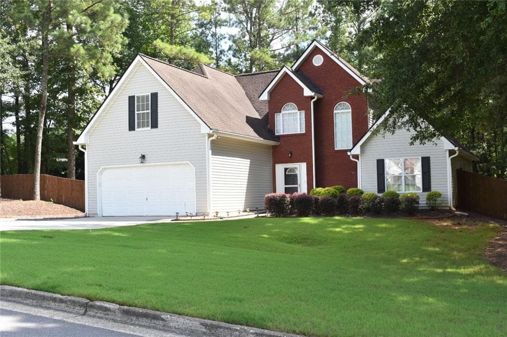 4 bedroom, 3 bathroom, 1,793 sq ft single family residence for sale at 602 Penhollaway Court, Loganville, GA 30052 — photo 3