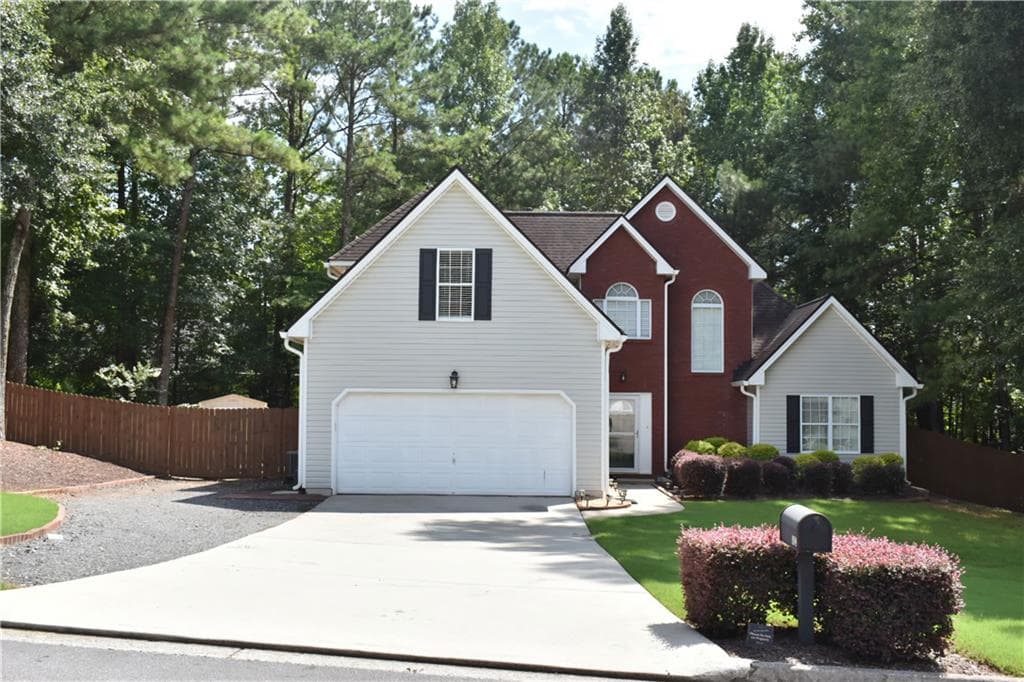 4 bedroom, 3 bathroom, 1,793 sq ft single family residence for sale at 602 Penhollaway Court, Loganville, GA 30052 — photo 2