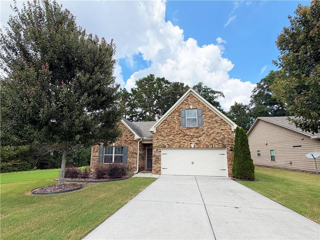 4 bedroom, 3 bathroom, 2,010 sq ft single family residence for sale at 1100 Sycamore Creek Trail, Sugar Hill, GA 30518 — photo 1 of 35