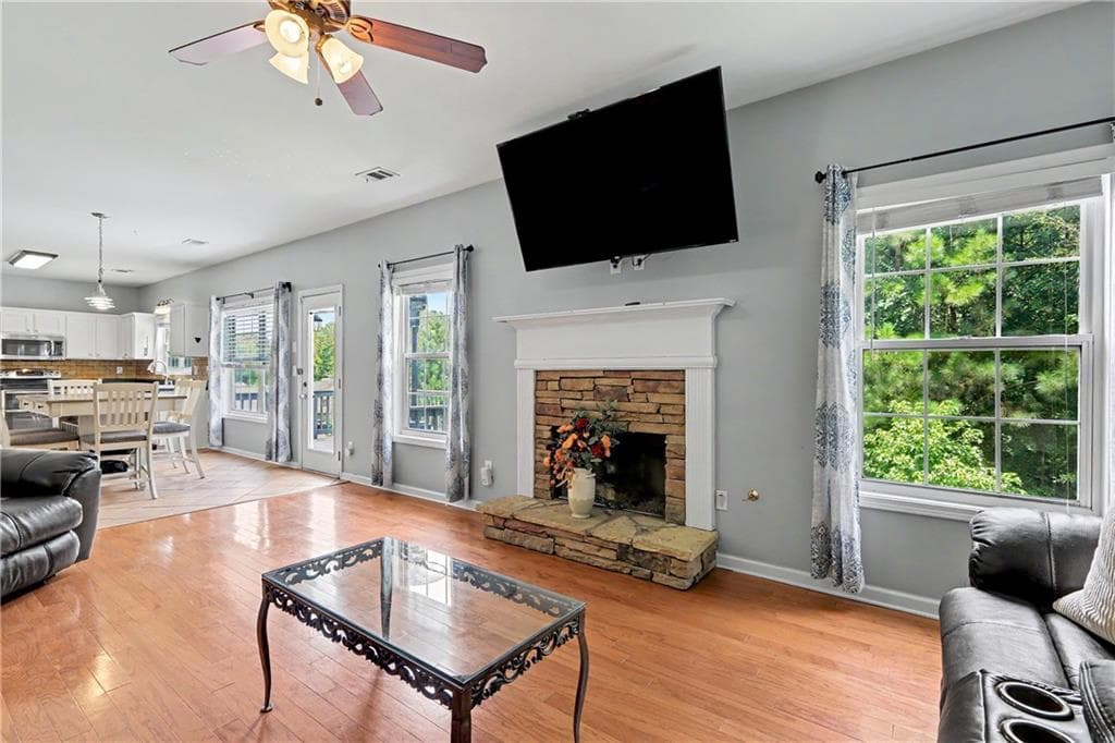 6 bedroom, 5 bathroom, 3,357 sq ft single family residence for sale at 1128 Bankside Court, Sugar Hill, GA 30518 — photo 4