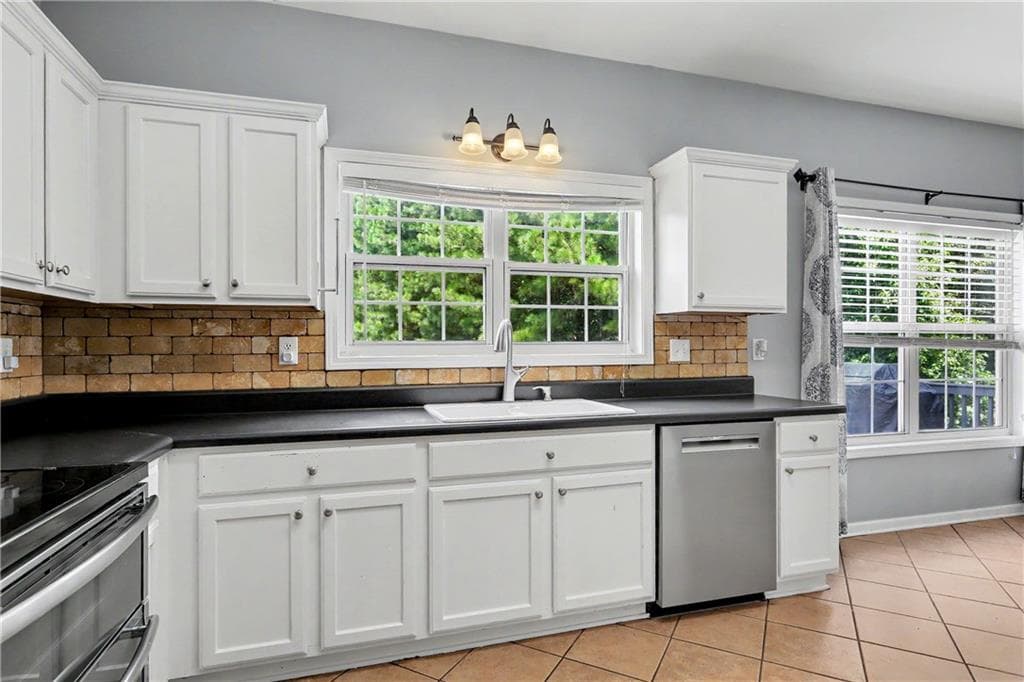 6 bedroom, 5 bathroom, 3,357 sq ft single family residence for sale at 1128 Bankside Court, Sugar Hill, GA 30518 — photo 8