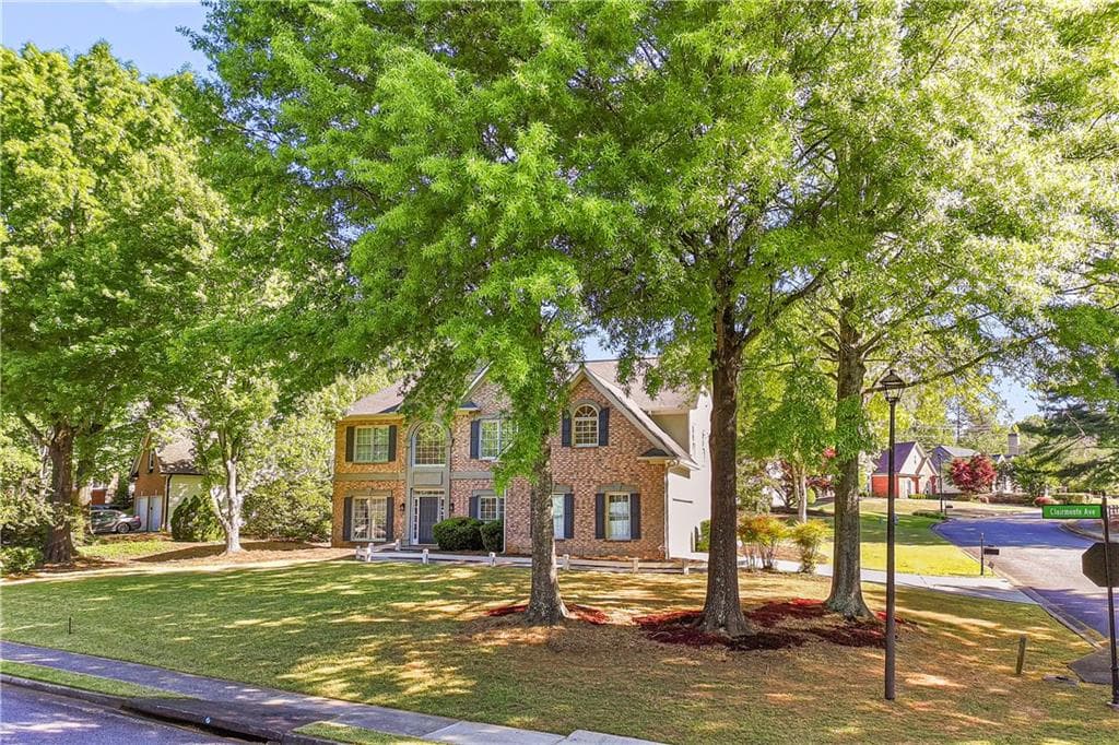 4 bedroom, 3 bathroom, 3,060 sq ft single family residence for sale at 12350 Clairmonte Avenue, Alpharetta, GA 30009 — photo 2