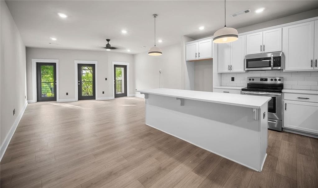 2 bedroom, 3 bathroom, 1,800 sq ft townhouse for sale at 2030 Main Street 206, Atlanta, GA 30318 — photo 2