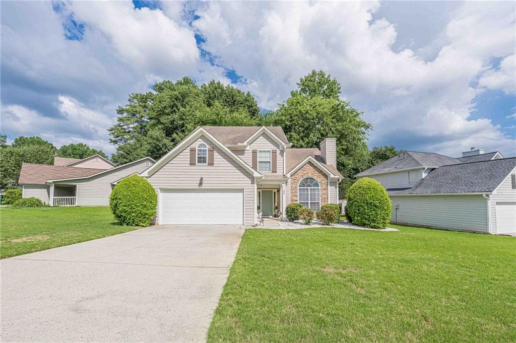3 bedroom, 3 bathroom, 2,052 sq ft single family residence for sale at 150 Tambec Trace, Lilburn, GA 30047 — photo 2