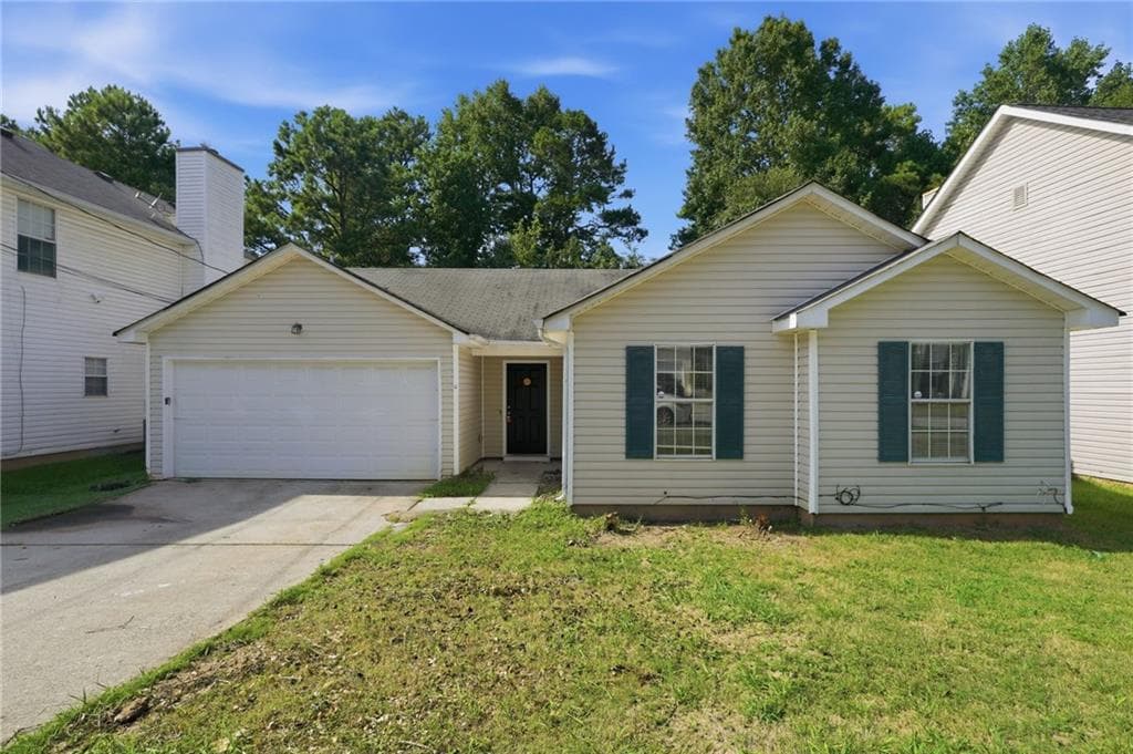 3 bedroom, 2 bathroom, 1,242 sq ft single family residence for sale at 5816 Wellborn Creek Drive, Lithonia, GA 30058