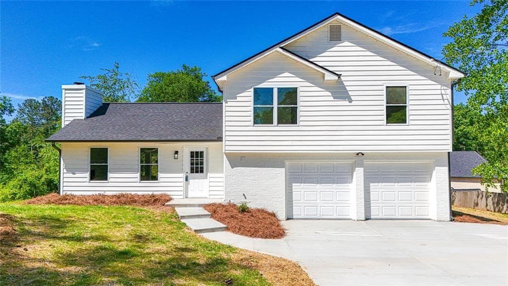 3 bedroom, 2 bathroom, 1,288 sq ft single family residence for sale at 4084 Dollar Circle, Suwanee, GA 30024 — photo 1 of 35